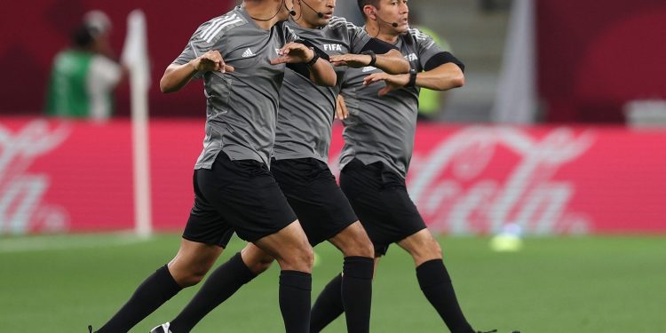 AL WAKRAH, QATAR - DECEMBER 11: Match Referee, Said Martinez and Assistant Referees, Walter Lopez and Christian Ramirez warm up prior to the FIFA Arab Cup Qatar 2021 Quarter-Final match between Egypt and Jordan at Al Janoub Stadium on December 11, 2021 in Al Wakrah, Qatar. (Photo by Maddie Meyer - FIFA/FIFA via Getty Images)